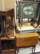 A mahogany and cross-banded Sutherland table on brown china castors,