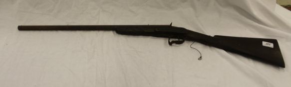 A 19th Century Continental (probably German) hammer action hunting rifle with engraved octagonal