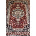 A modern machine made Persian style rug,