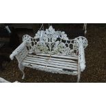 A painted cast iron and wooden garden bench in the Coalbrookedale style,