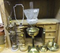 A Victorian brass bodied oil lamp with clear glass chimney and etched glass shade,