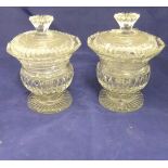 A pair of 19th Century cut glass sweetmeat dishes and covers