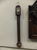 A Regency mahogany cased stick barometer,