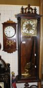 A Vienna type regulator wall clock and a modern mahogany and inlaid wall clock with dial inscribed
