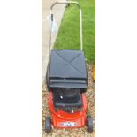 A Rover petrol lawnmower with a Briggs & Stratton Quantum XE40 engine,