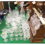 A large collection of 19th and 20th Century cut glass ware to include an oak and brass tantalus
