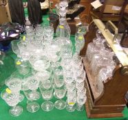 A large collection of 19th and 20th Century cut glass ware to include an oak and brass tantalus