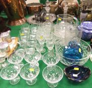 A collection of glassware to include a pair of 19th Century cut glass decanters with slim necks,