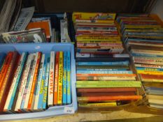 Five boxes of assorted children's books to include Blue Peter Annuals, Tom & Jerry,