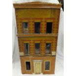 A vintage wooden doll's townhouse,