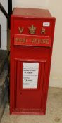 A reproduction Victorian style GPO post box with red paintwork *