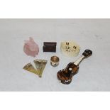 A miniature tortoiseshell and mother of pearl inlaid guitar ornament,