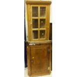 An 19th Century oak single door corner wall hanging cabinet,