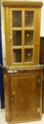 An 19th Century oak single door corner wall hanging cabinet,