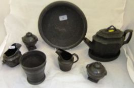 A pair of Wedgwood & Bentley of Etruria black basalt side urns of small proportions,