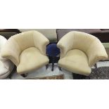 A pair of tub style armchairs in oatmeal patterned upholstery,