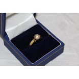 A 10 carat gold solitaire diamond ring