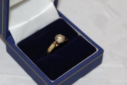 A 10 carat gold solitaire diamond ring