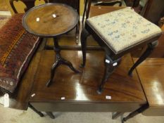 A mahogany and cross-banded demi-lune side table on three turned and reeded legs,