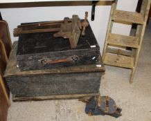 A vintage pine tool chest containing a collection of various vintage tools,