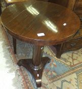 A rosewood centre table,