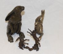 A bronze figural group of boxing hares, monogrammed "MS" and No'd.