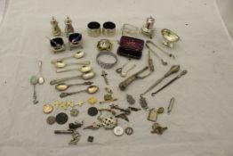 A box containing a collection of silver and other wares to include silver stamp holder in the form