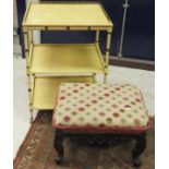 A rosewood framed needlework topped footstool, raised on carved cabriole legs to scroll feet,