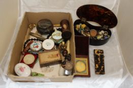 A box containing assorted thimbles and accoutrements to include a 19th Century tortoiseshell needle