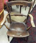 An Oxford oak bar back carver chair,