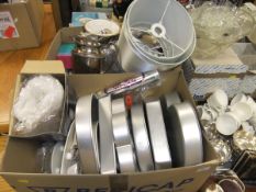 Two boxes of miscellaneous items, to include a large collection of shaped cake tins,