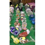 A collection of clear and coloured glass ornaments to include dolphin, birds, whale, cat, elephant,