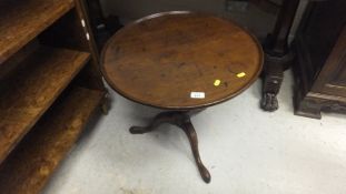 A mahogany circular occasional table,