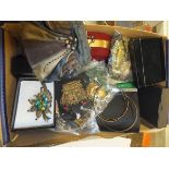 A box of assorted costume jewellery and a tin of buttons together with a box of assorted coin sets,