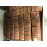 Sixteen boxes of hardback books to include a large selection of Encyclopaedia Britannica,