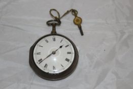 A George III silver pair cased watch, the white enamel dial set with Roman numerals,