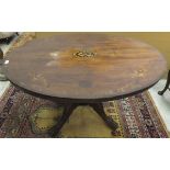 A Victorian walnut and inlaid oval topped centre table,