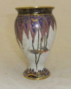 A Carlton ware vase "Tree and Swallow" on a mottled cream ground, No.
