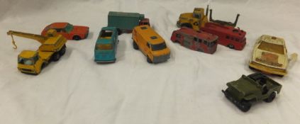 Two boxes containing a large selection of toy cars, lorries, etc, to include Matchbox, Solido,