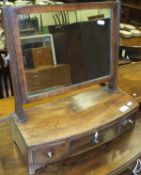 A rectangular mahogany toilet mirror,