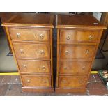 A pair of slim flame mahogany and crossbanded chests of four drawers in the 19th Century style,