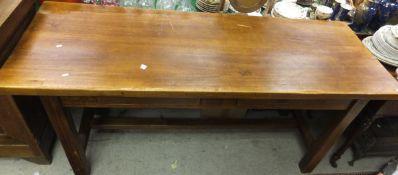 A large hardwood serving table, the plain top above two drawers,
