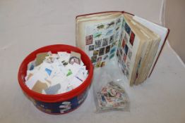 A box containing "The Pelham Junior Stamp Album" containing various UK and World postage stamps,