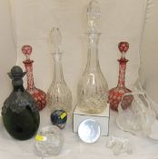 A pair of 19th Century cranberry overlaid cut glass decanters,