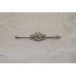 A white gold mounted diamond cluster brooch of flowerhead and foliate design, 6.