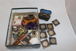 A box containing a collection of costume jewellery, a silver lidded dressing table jar,