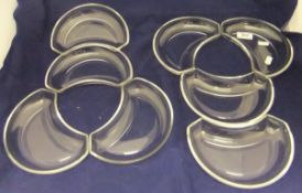 A set of eight crescent shaped glass dishes by Val St.