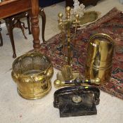 A Victorian cast iron book press with gilt faux marbled decoration and brass handles,