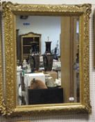 A pair of Victorian giltwood and gesso framed wall mirrors,