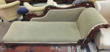 A Victorian mahogany framed chaise longue in green ground upholstery,